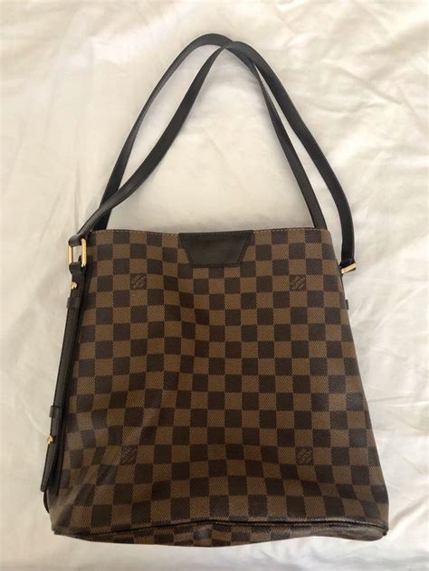 louis vuitton coated fabric cowhide leather trim|louis vuitton leather bag interior.